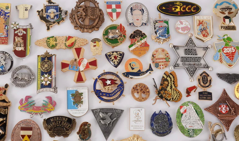 Are Custom Metal Badges Better Than Plastic Ones?