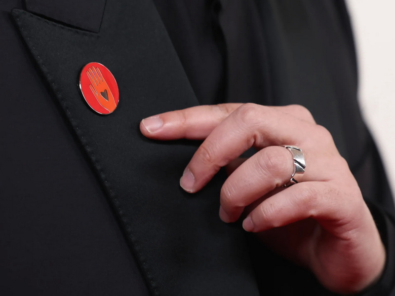 History of the Red Hand Pin