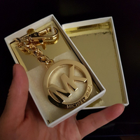 //iororwxhmqprli5p.ldycdn.com/cloud/llBppKpmlmSRilkjkoinjp/How-To-Spot-A-Real-Michael-Kors-Keyring.jpg