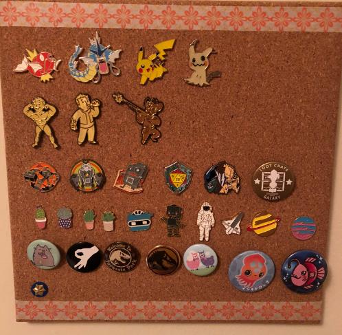 Enamel Pins Stay in A Coark Board