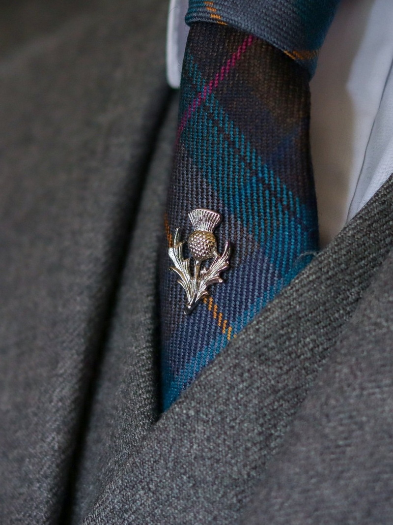 A Lapel Pin on A Tie